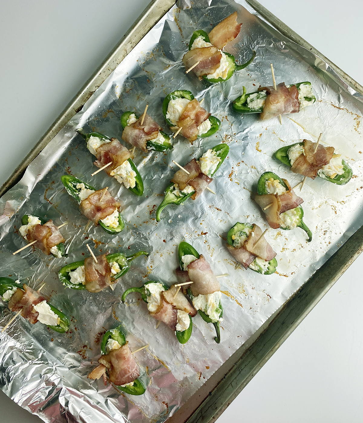 Stuffed jalapeno poppers ready for the oven.