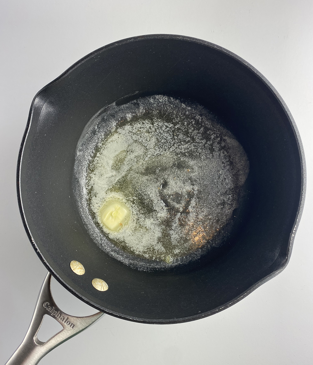 Butter melting in a pot.