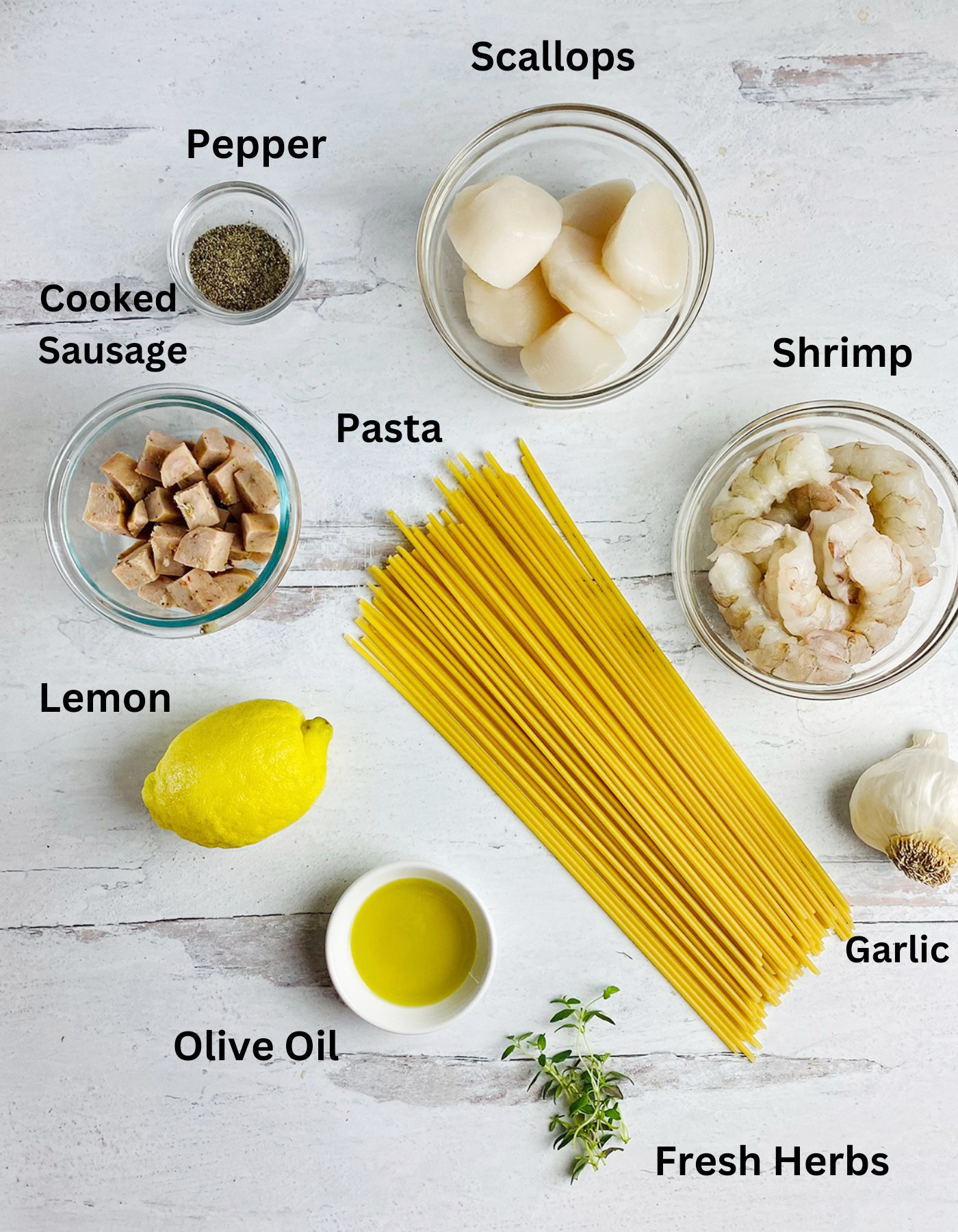 Ingredients needed for grilled seafood packets.