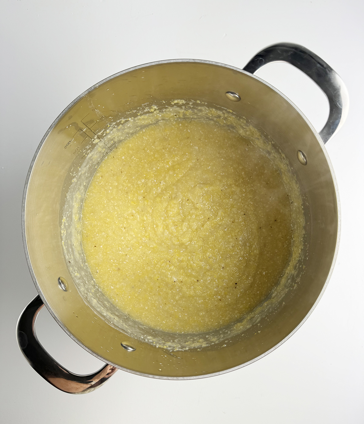 Cooked grits in a pot.