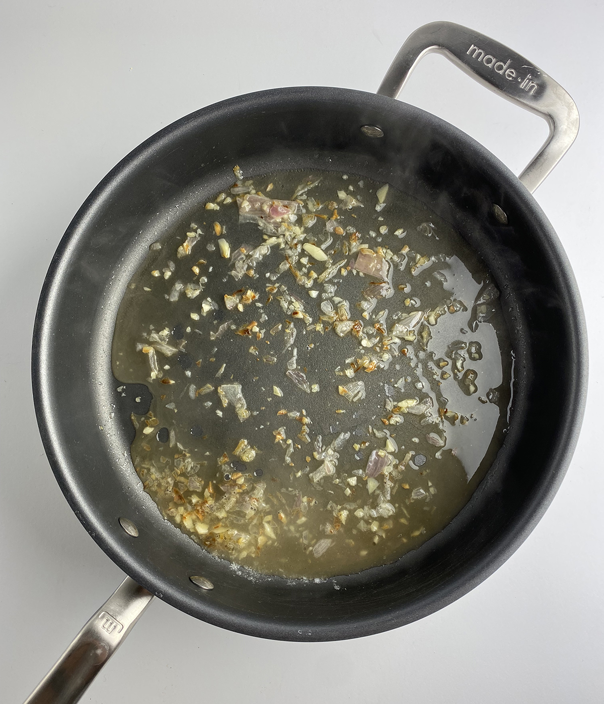 Shallots cooking in butter.