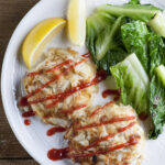 Crab Cakes on a plate with lemon.