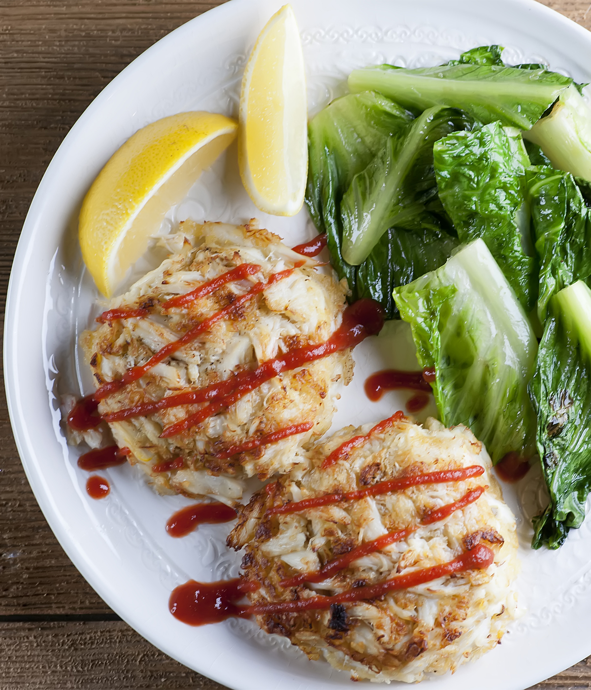 Crab Cakes on a plate with lemon.