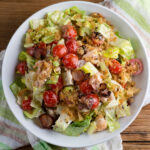 Lobster BLT salad in a bowl.