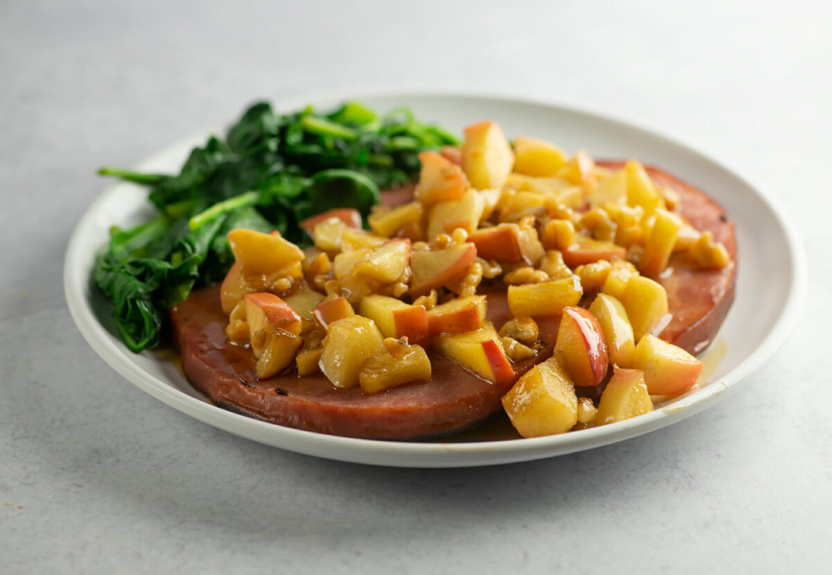 https://www.framedcooks.com/wp-content/uploads/2022/10/Ham-with-apple-walnut-sauce-e1696087608717.jpg